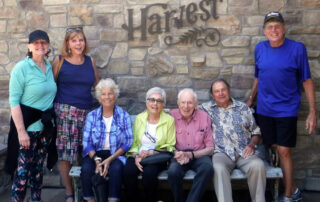 A group sitting after lunch at the Harvest restaurant with Arnold and Bonnie Hano
